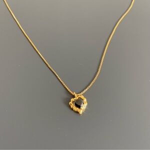 Elegant Gold and Black Pendant Necklace